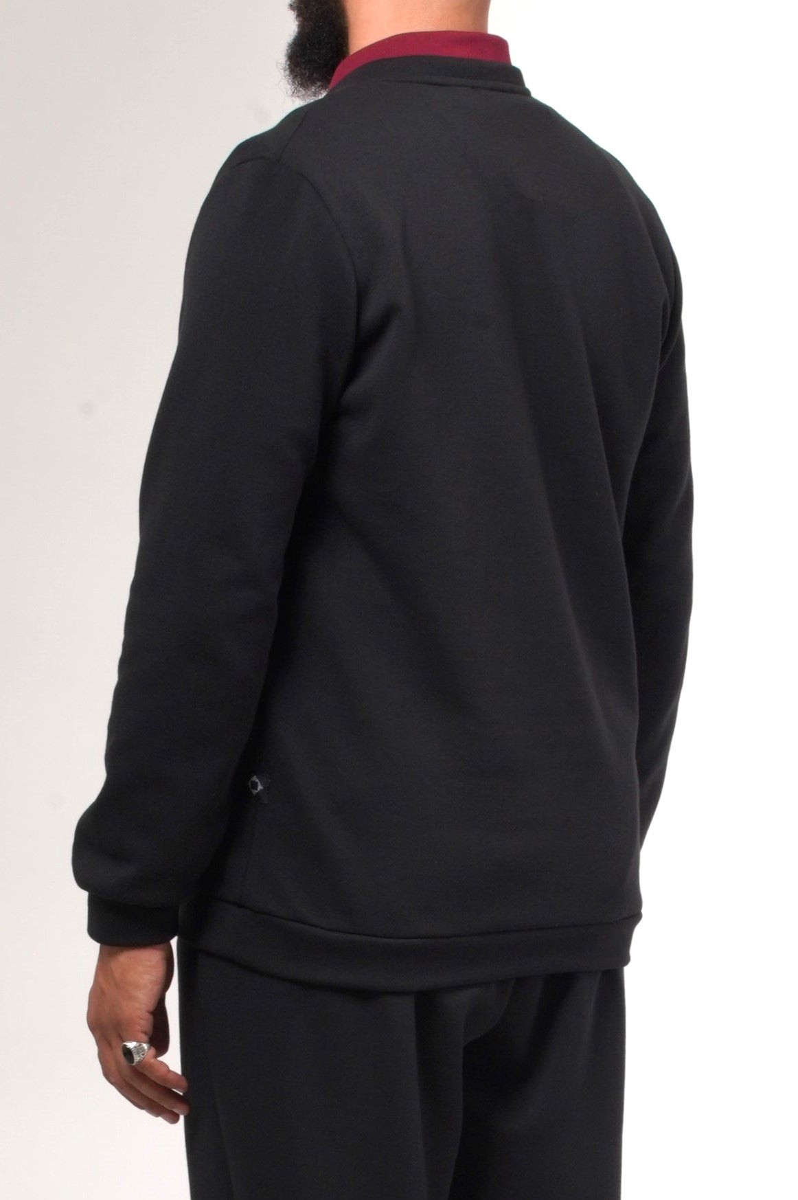 Pull Vietri noir vu de dos, coupe épurée