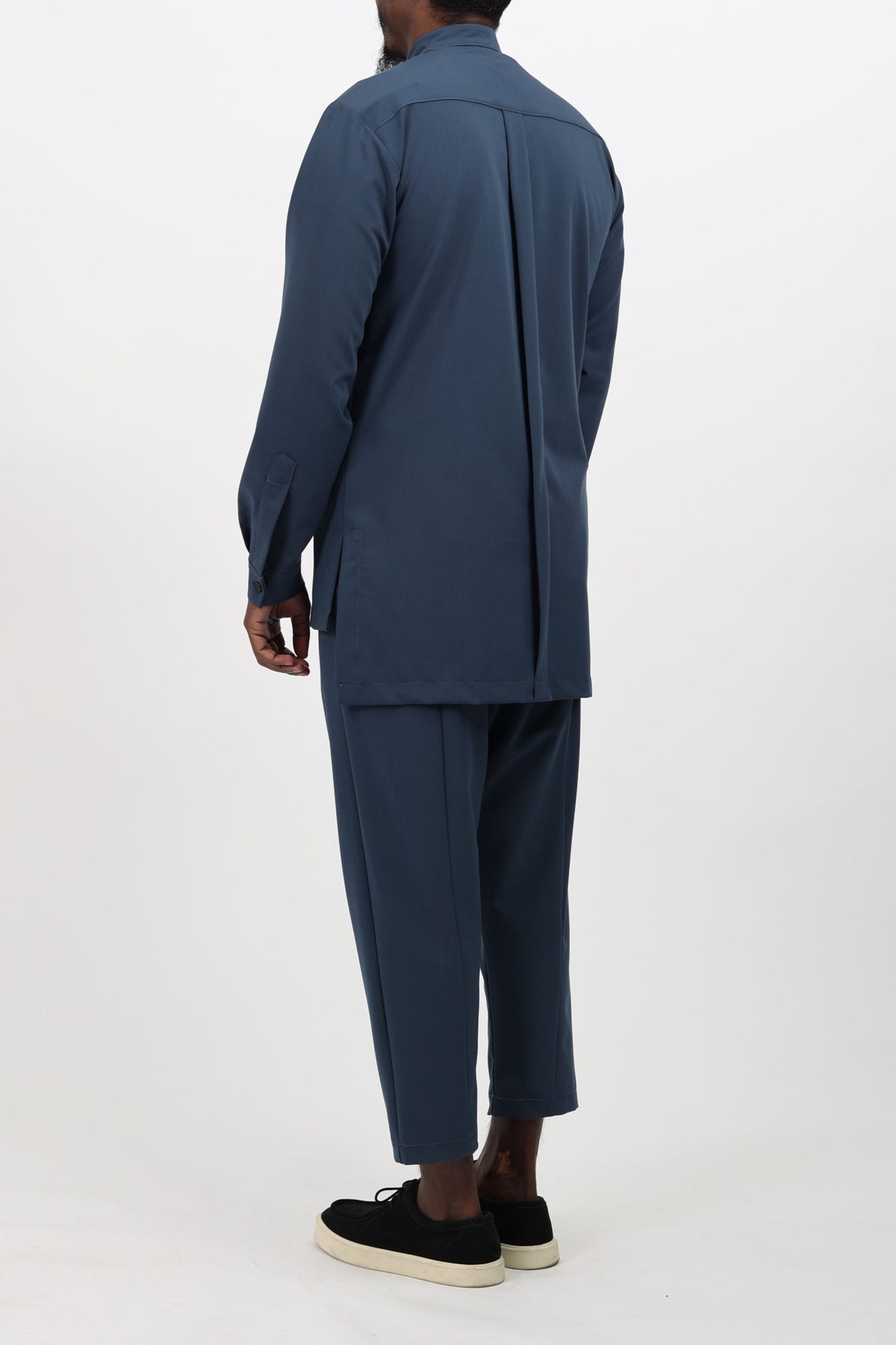 Ensemble NewFit mi-saison bleu pétrole vu de dos