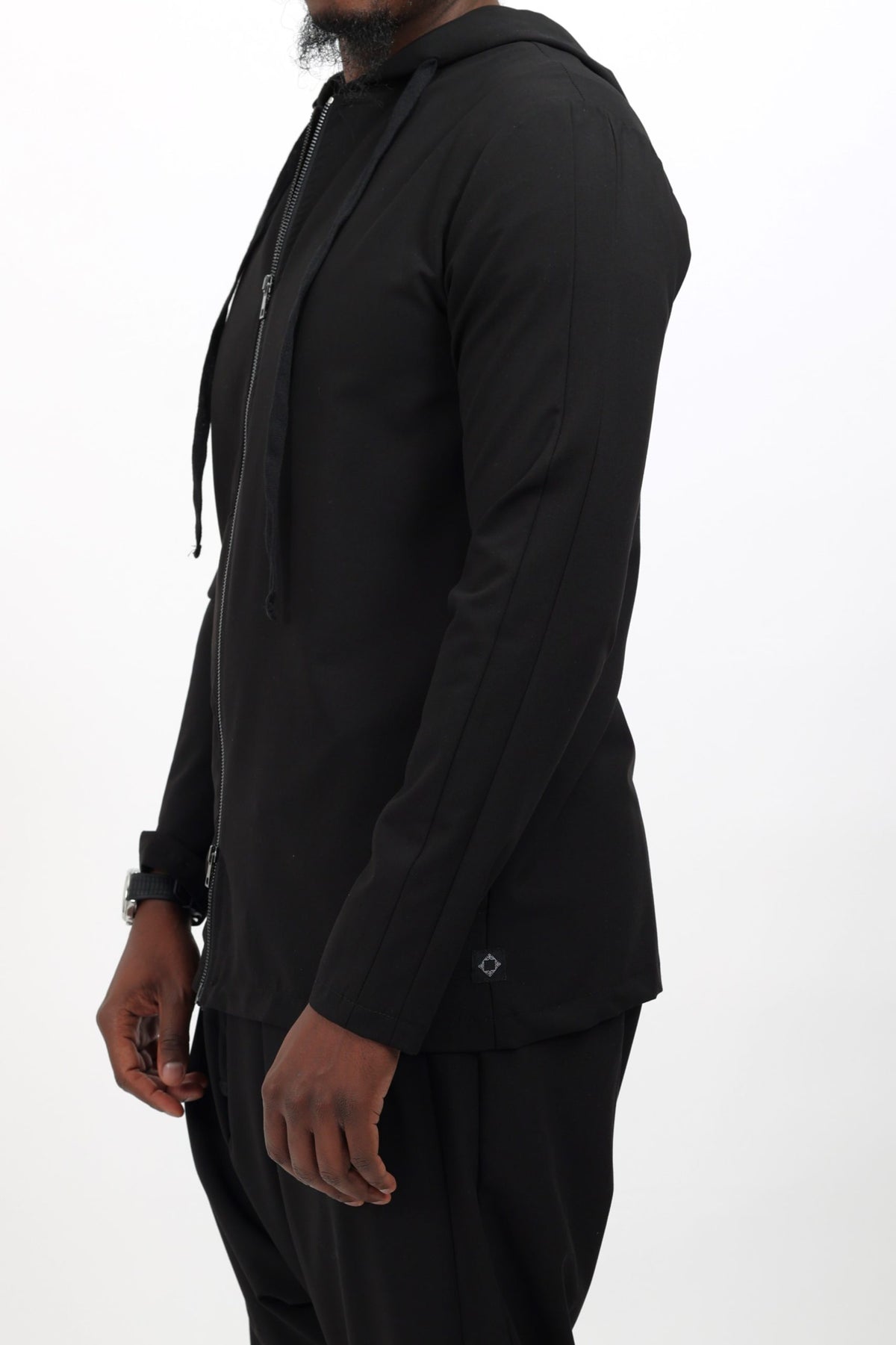 Veste de survêtement sport chic noire de profil